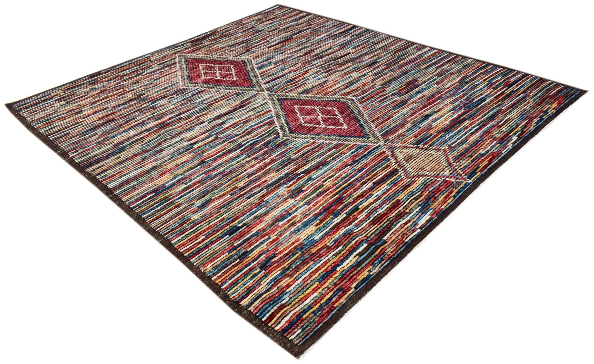 An Afghan Yekta rug featuring a multicolored striped pattern with geometric diamond motifs.