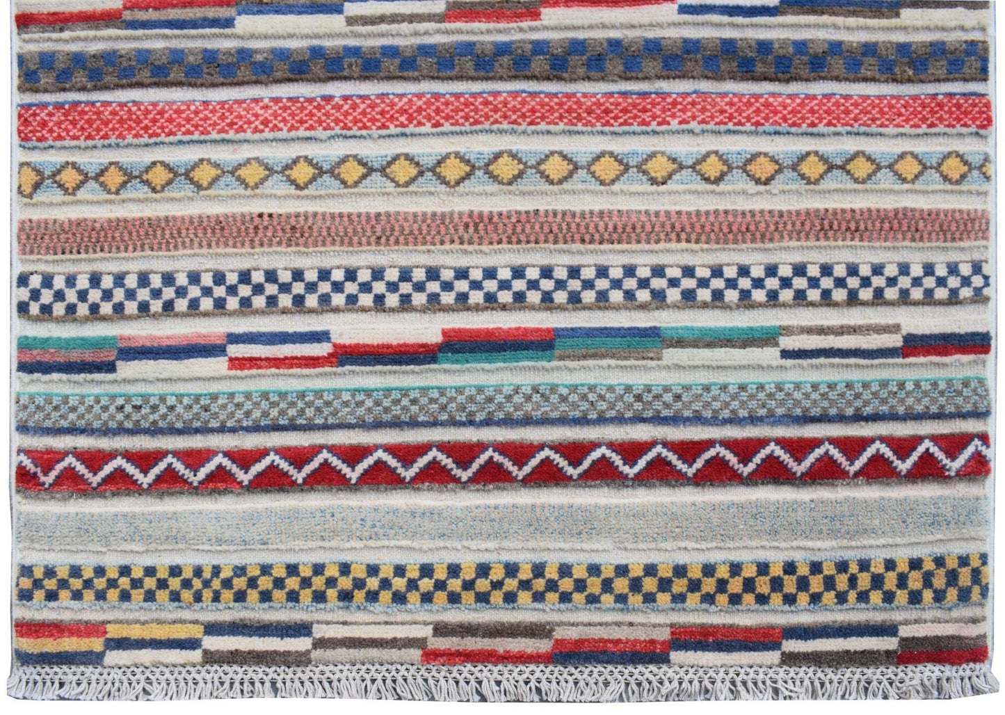 An Afghan Yekta runner rug featuring horizontal bands of geometric patterns in vibrant colors.