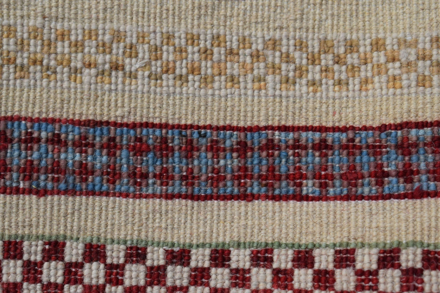Afghan Yekta Runner with geometric patterns in red, blue, and beige.