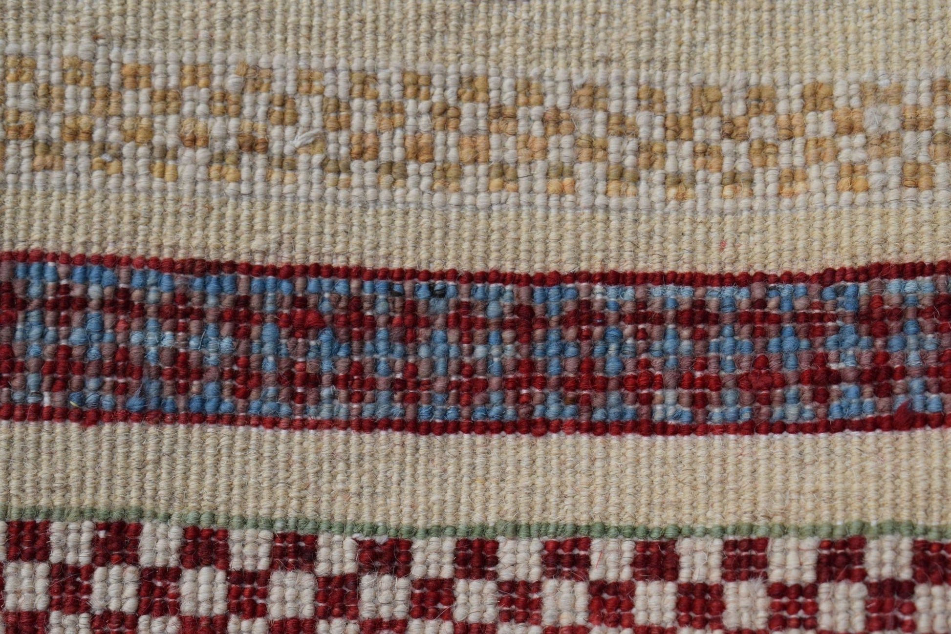 Afghan Yekta Runner with geometric patterns in red, blue, and beige.