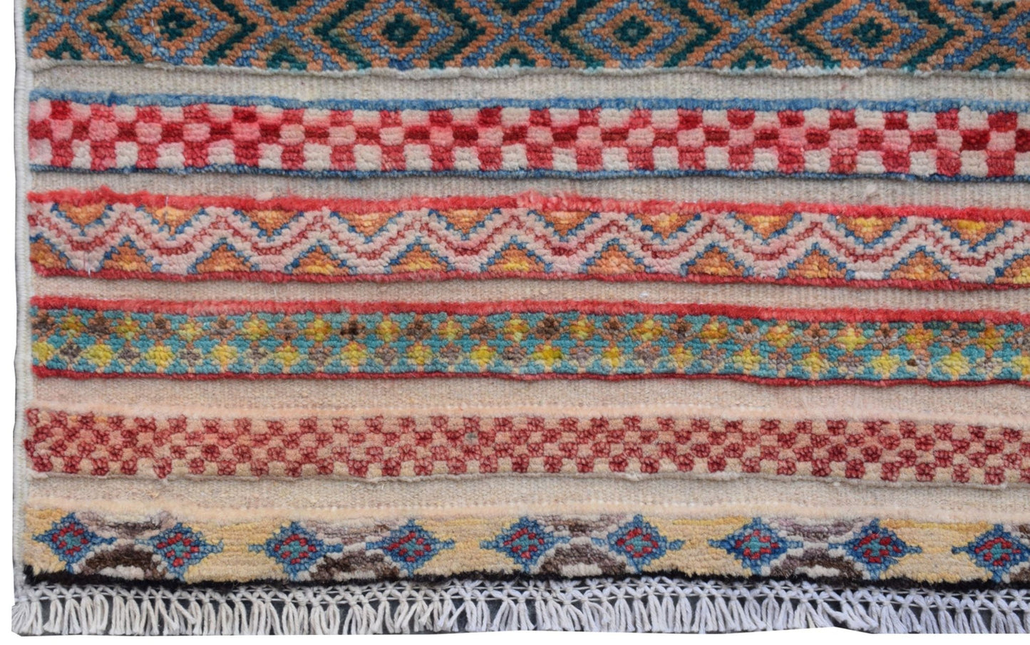 An Afghan Yekta runner featuring a series of colorful, hand-knotted geometric and checkered bands.