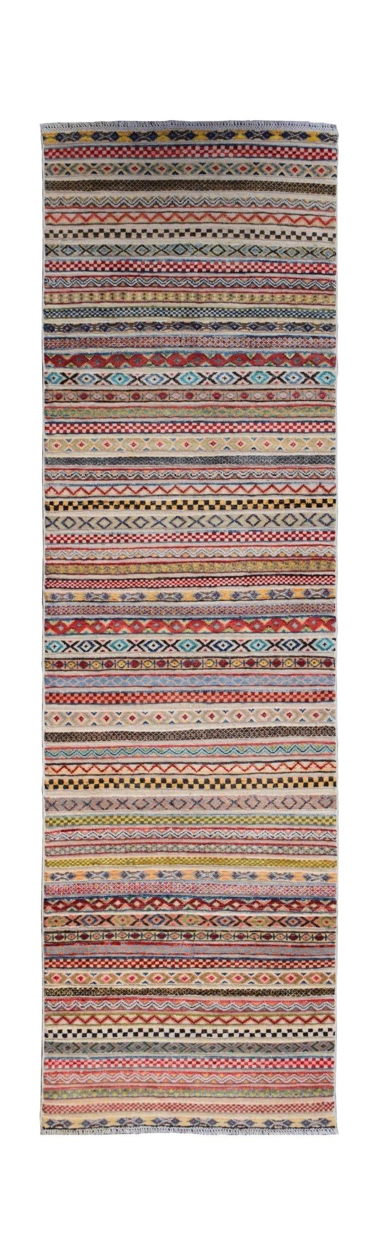 This handmade Afghan Yekta runner features a vibrant, multi-colored geometric striped pattern.