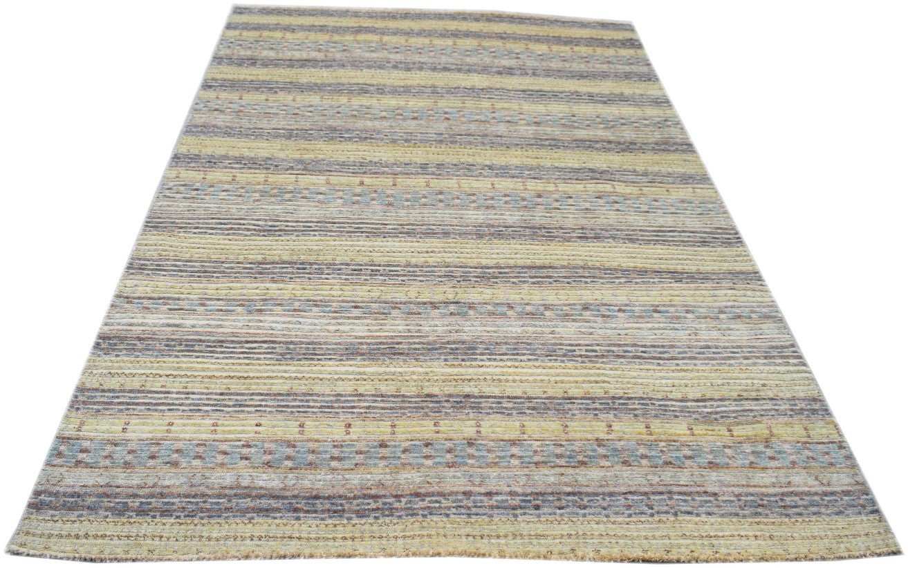 Handmade Afghan Yekta rug featuring a textured, multi-colored striped pattern in wool.