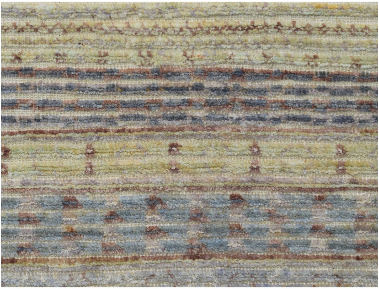 An Afghan Yekta rug featuring horizontal stripes in muted tones of yellow, blue, and brown.
