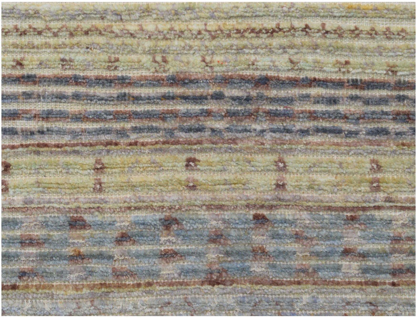 An Afghan Yekta rug featuring horizontal stripes in muted tones of yellow, blue, and brown.