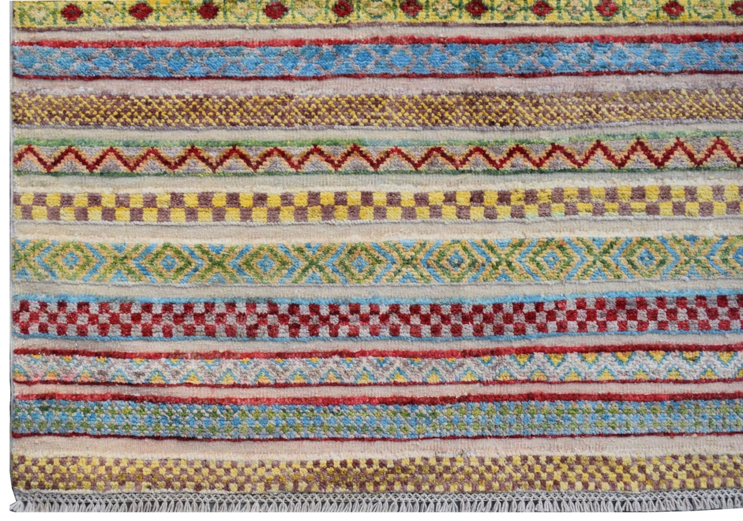 Handmade Afghan Yekta rug featuring a vibrant, multi-colored geometric striped pattern.