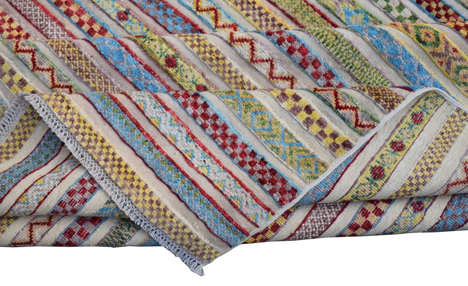 A handmade Afghan Yekta rug featuring colorful, diagonal striped patterns on a cream background.