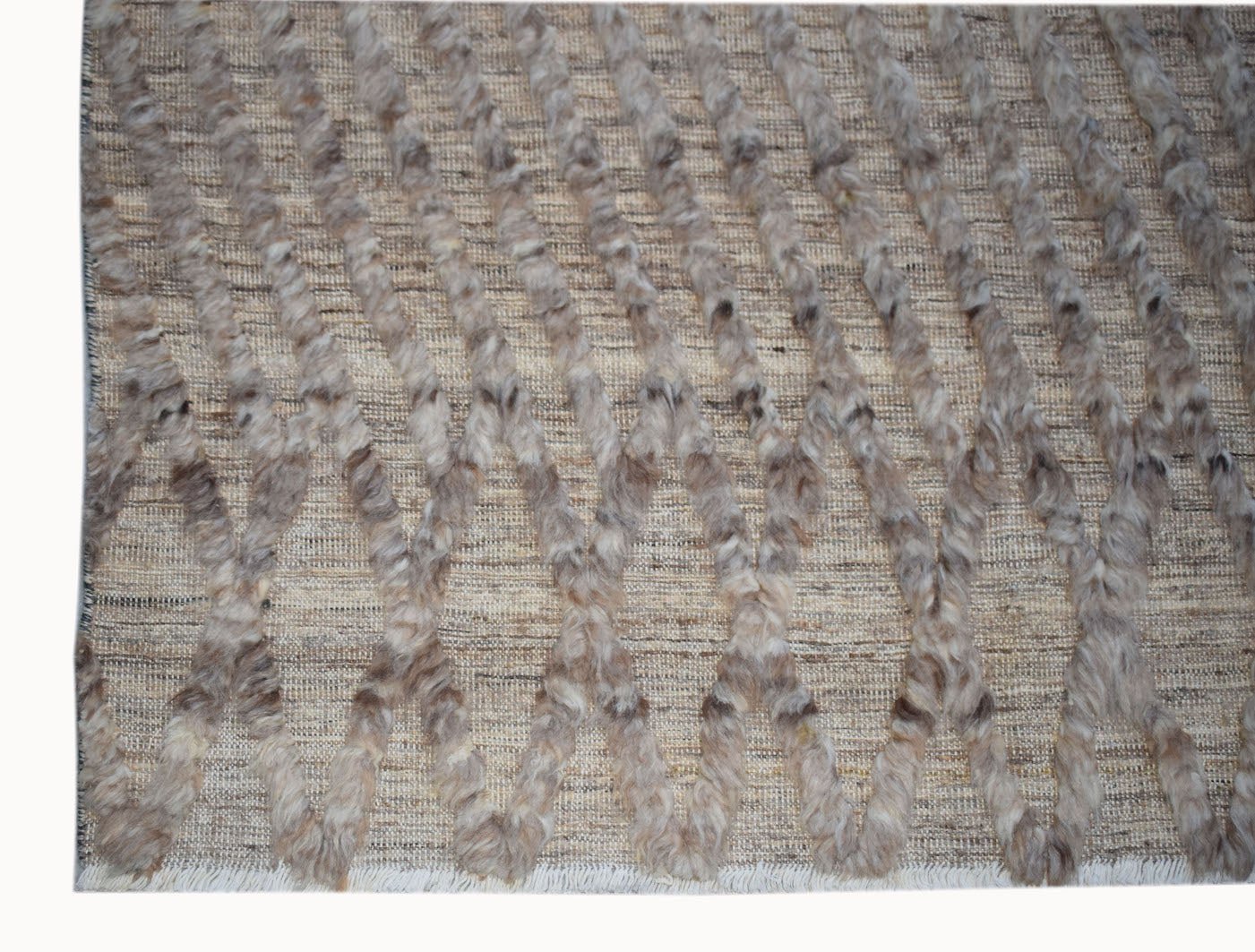 Handmade Afghan Yekta rug featuring a textured diamond pattern in neutral wool tones.