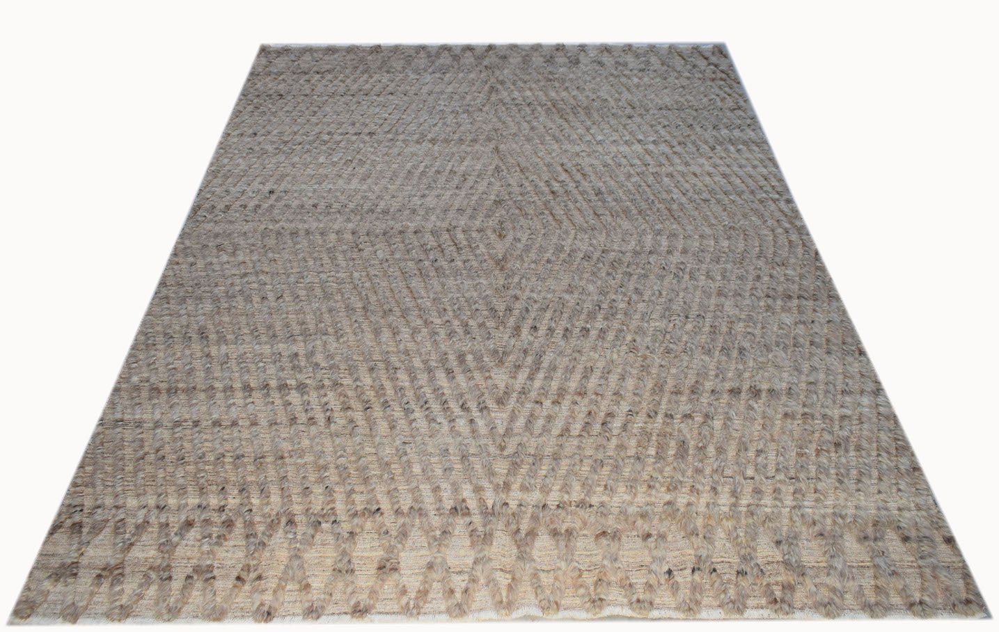 An Afghan Yekta rug featuring a textured diamond pattern in neutral wool tones.