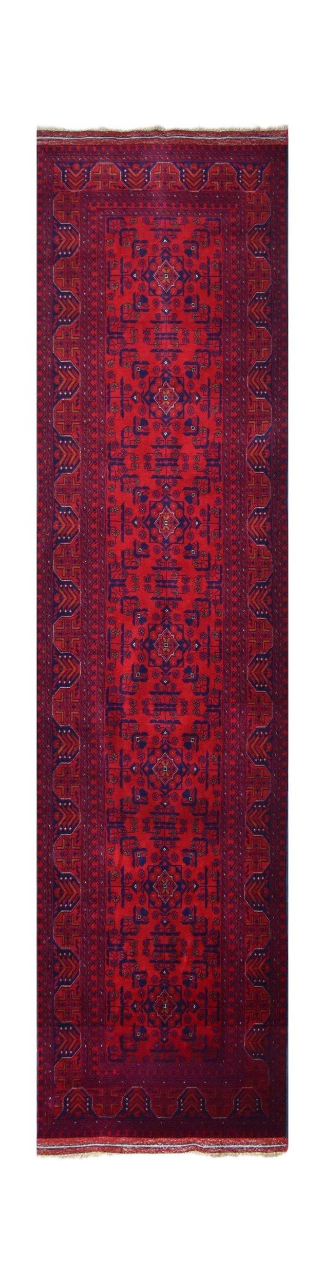 A handmade Afghan Biljik runner rug featuring deep red tones and intricate blue geometric patterns.