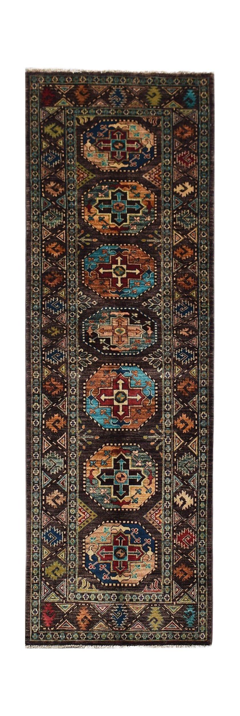 Handwoven Afghan Chobi runner rug featuring a dark brown field with repeating geometric medallions.