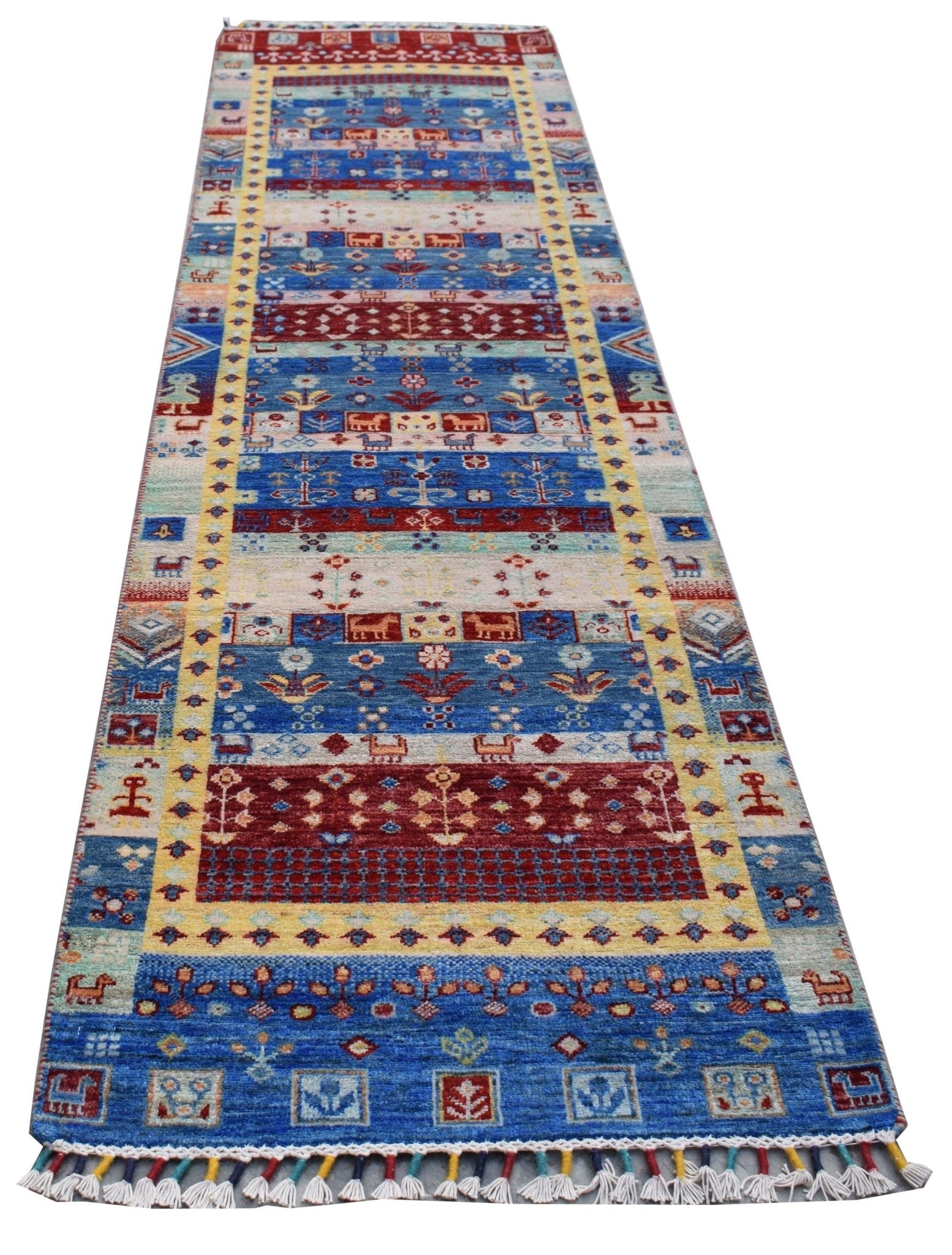 A handmade Afghan Chobi runner rug featuring a vibrant geometric pattern in blue, red, and yellow.