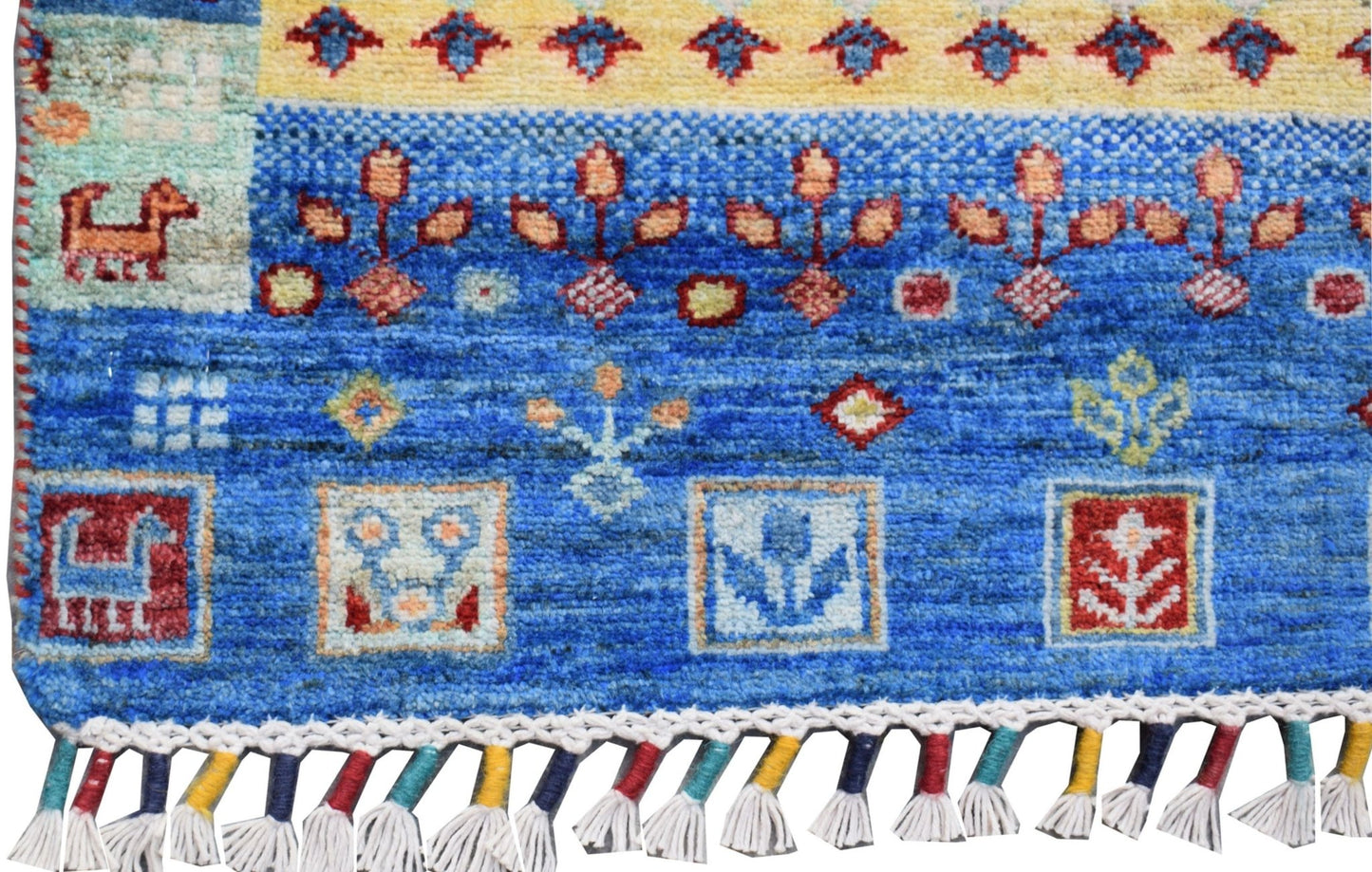 Handmade Afghan Chobi runner featuring blue and yellow geometric patterns with a tasseled fringe.