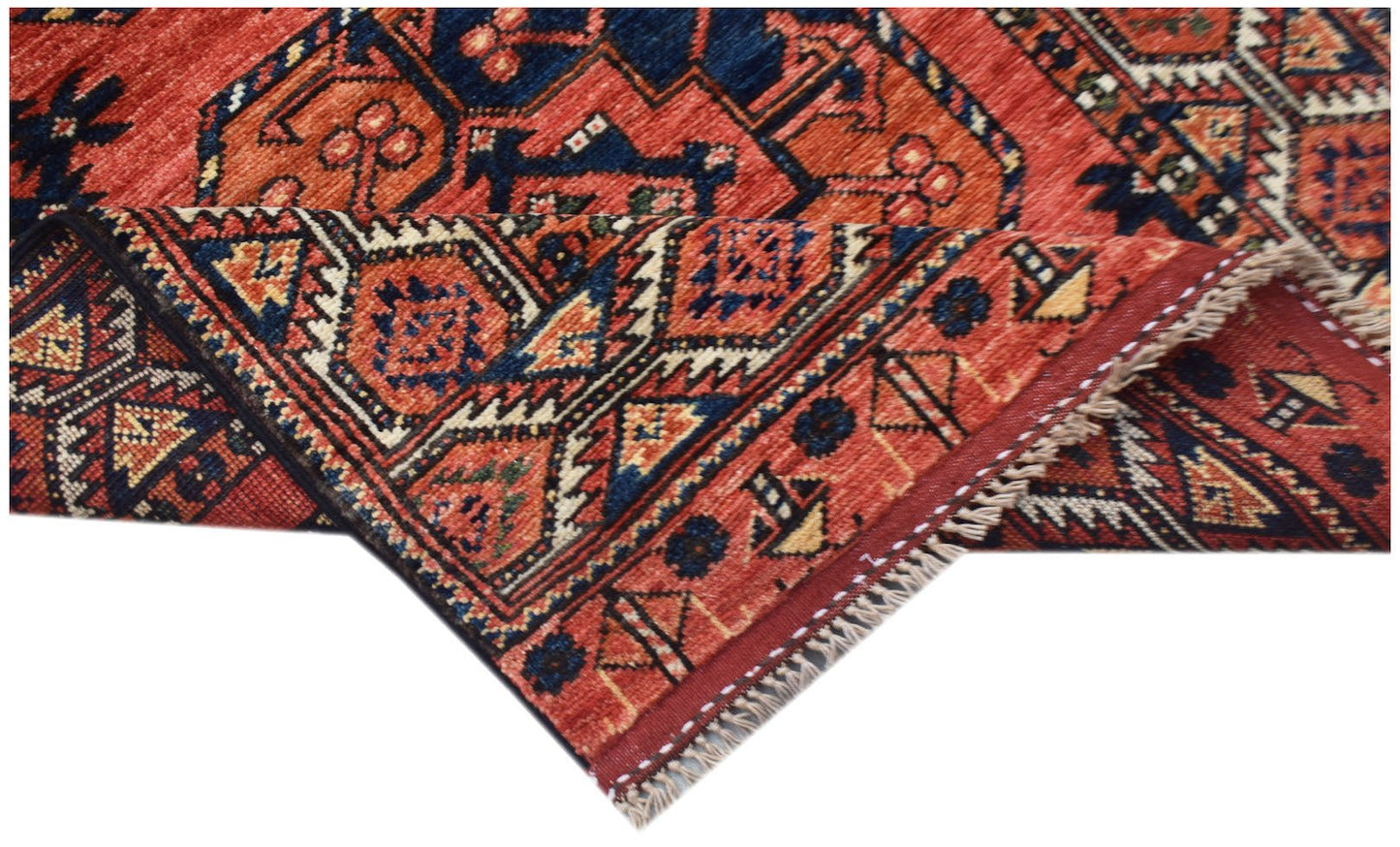 A handwoven Afghan Chobi runner featuring traditional geometric patterns in red and blue tones.