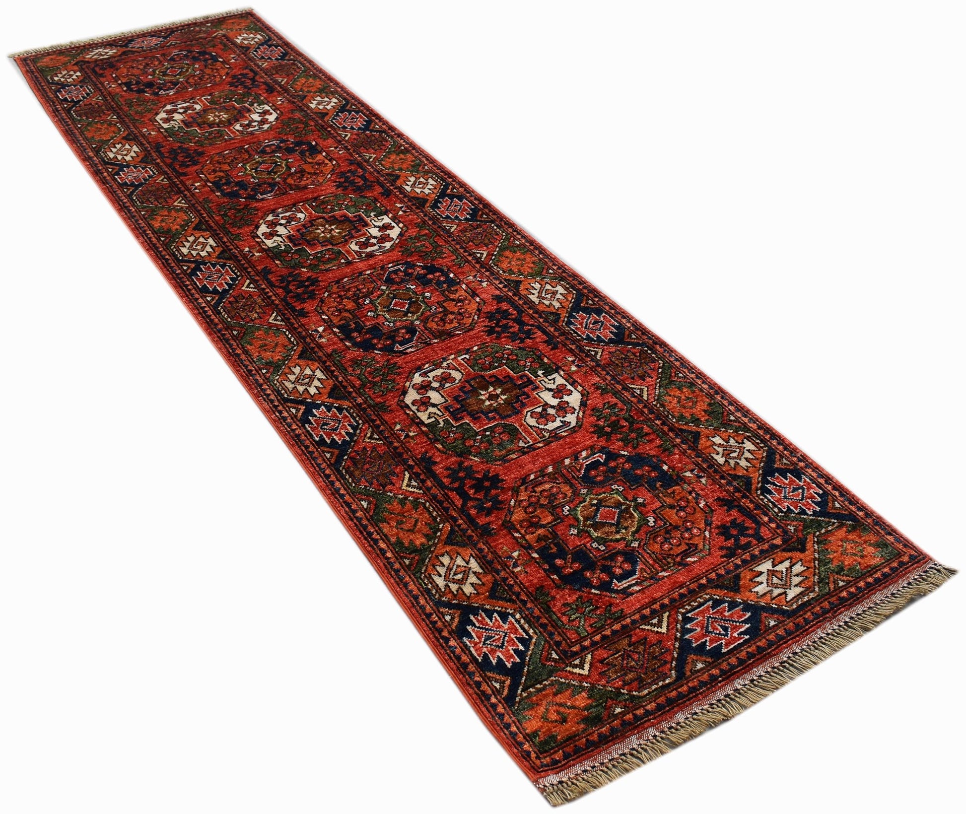A handmade Afghan Chobi runner rug featuring traditional geometric patterns in red and blue tones.