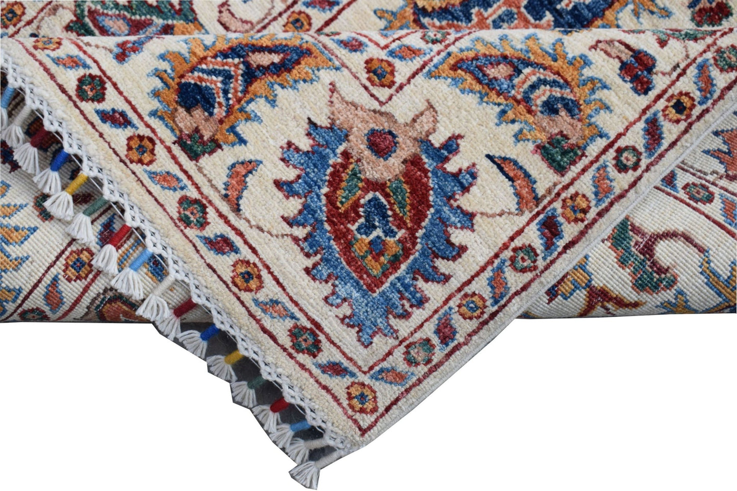 A handmade Afghan Chobi runner featuring a traditional Suzani pattern in vibrant wool colors.