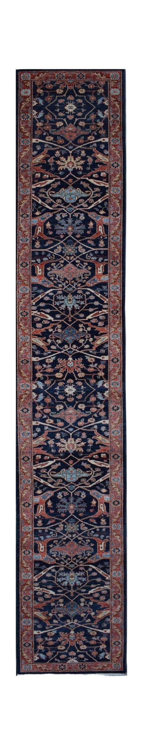 A handmade Afghan Chobi runner rug featuring a traditional floral pattern in blue and red tones.