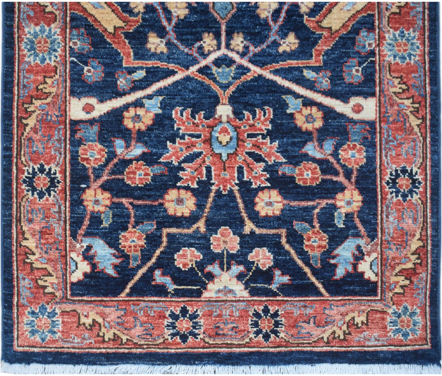 A handmade Afghan Chobi runner featuring a traditional floral pattern in blue, red, and beige.