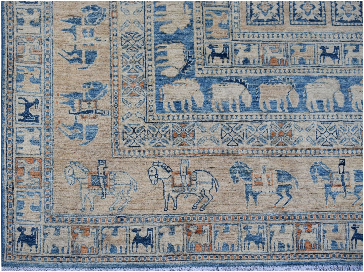 Handmade Afghan Chobi rug featuring a Pazyryk-inspired pattern of horses and geometric borders.