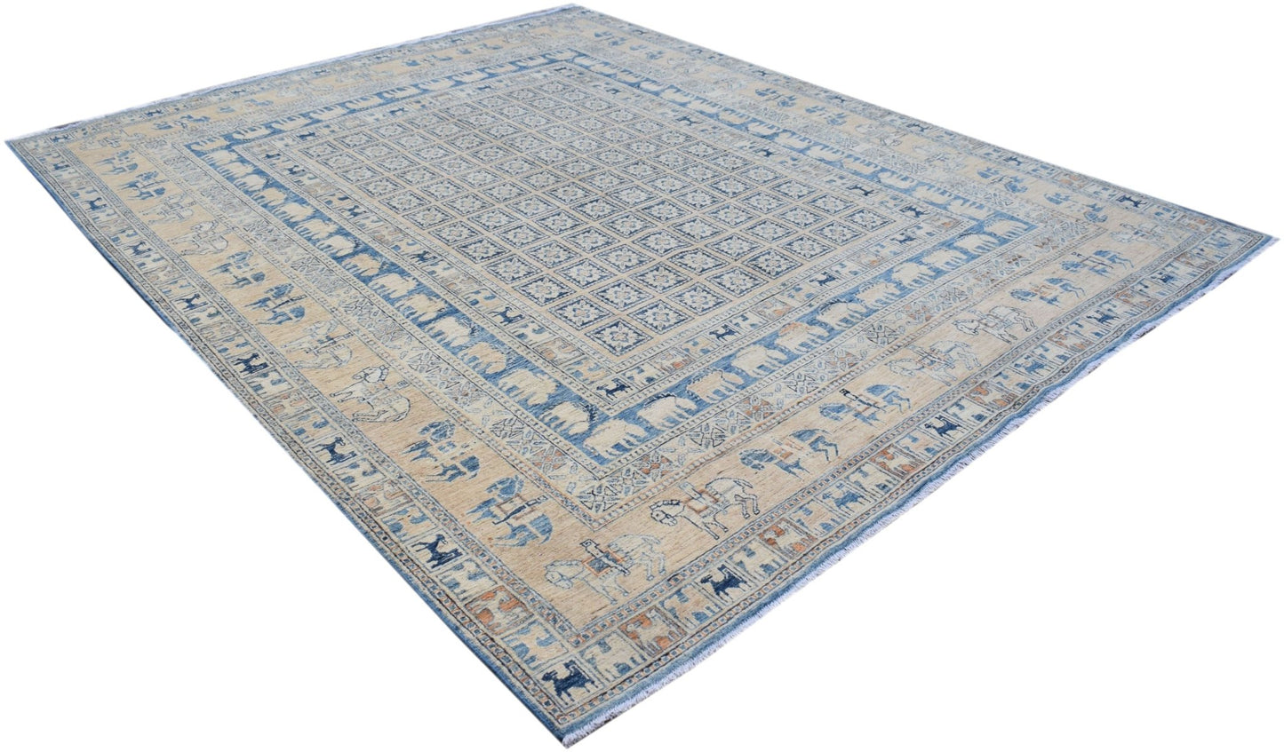 A handmade Afghan Chobi rug featuring a Pazyryk-inspired grid pattern with blue and beige tones.