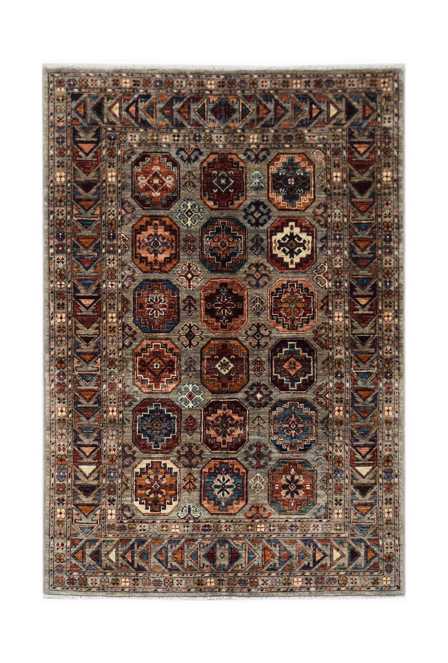 Handmade Afghan Chobi rug featuring a grey field with repeating geometric octagonal medallions.