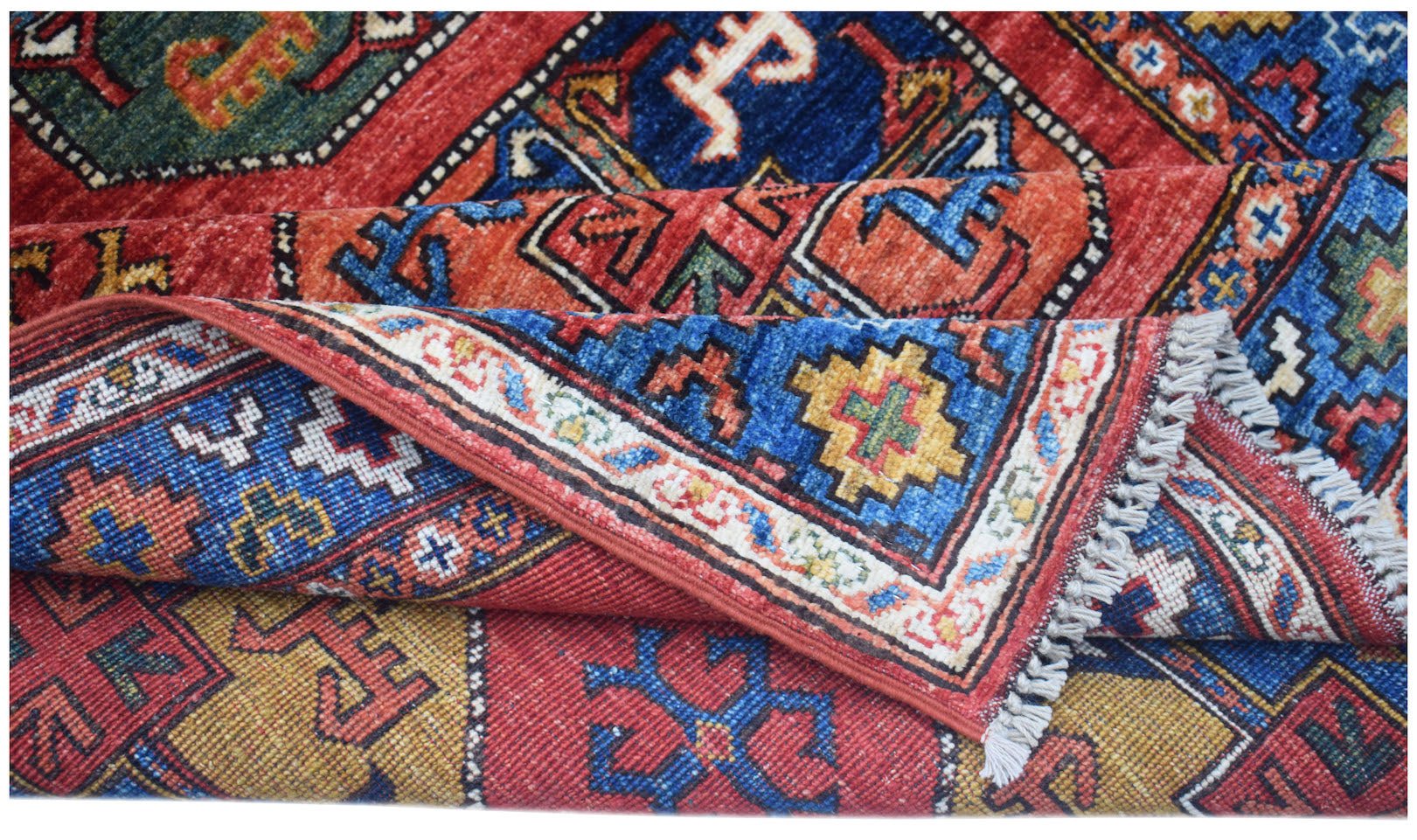 A handwoven Afghan Chobi rug featuring a geometric pattern in vibrant red, blue, and yellow tones.