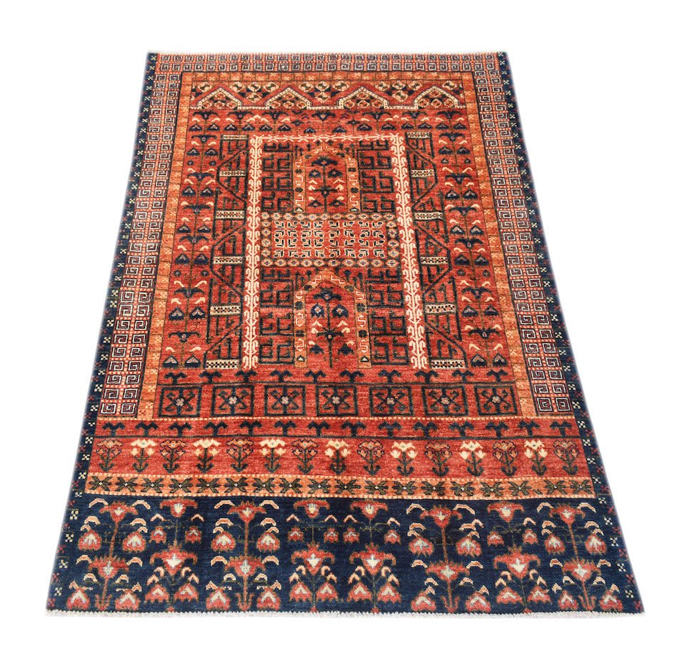 A rectangular Afghan Chobi rug featuring traditional geometric patterns in red and navy blue.