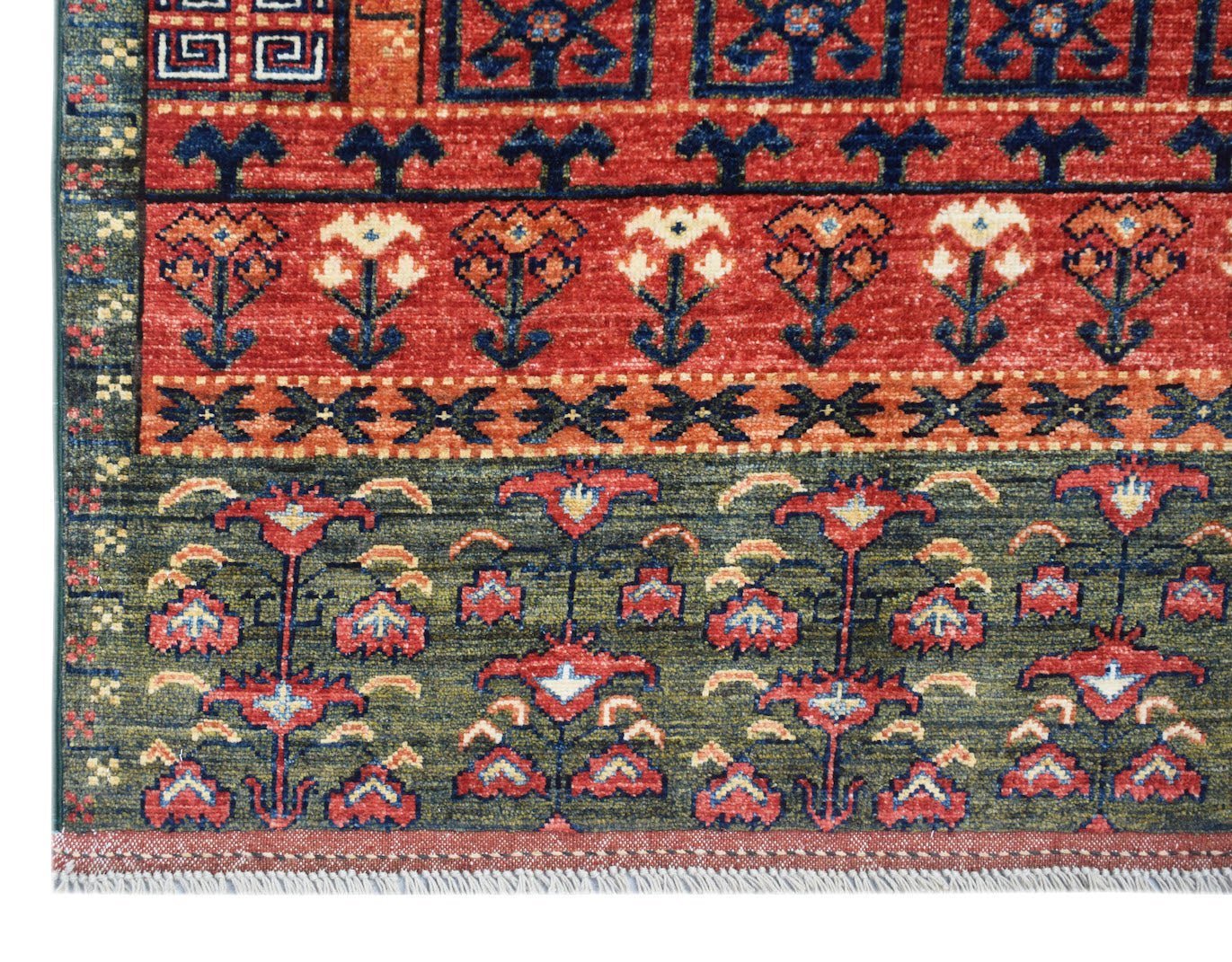 A handwoven Afghan Chobi rug featuring traditional floral patterns in red, blue, and green tones.