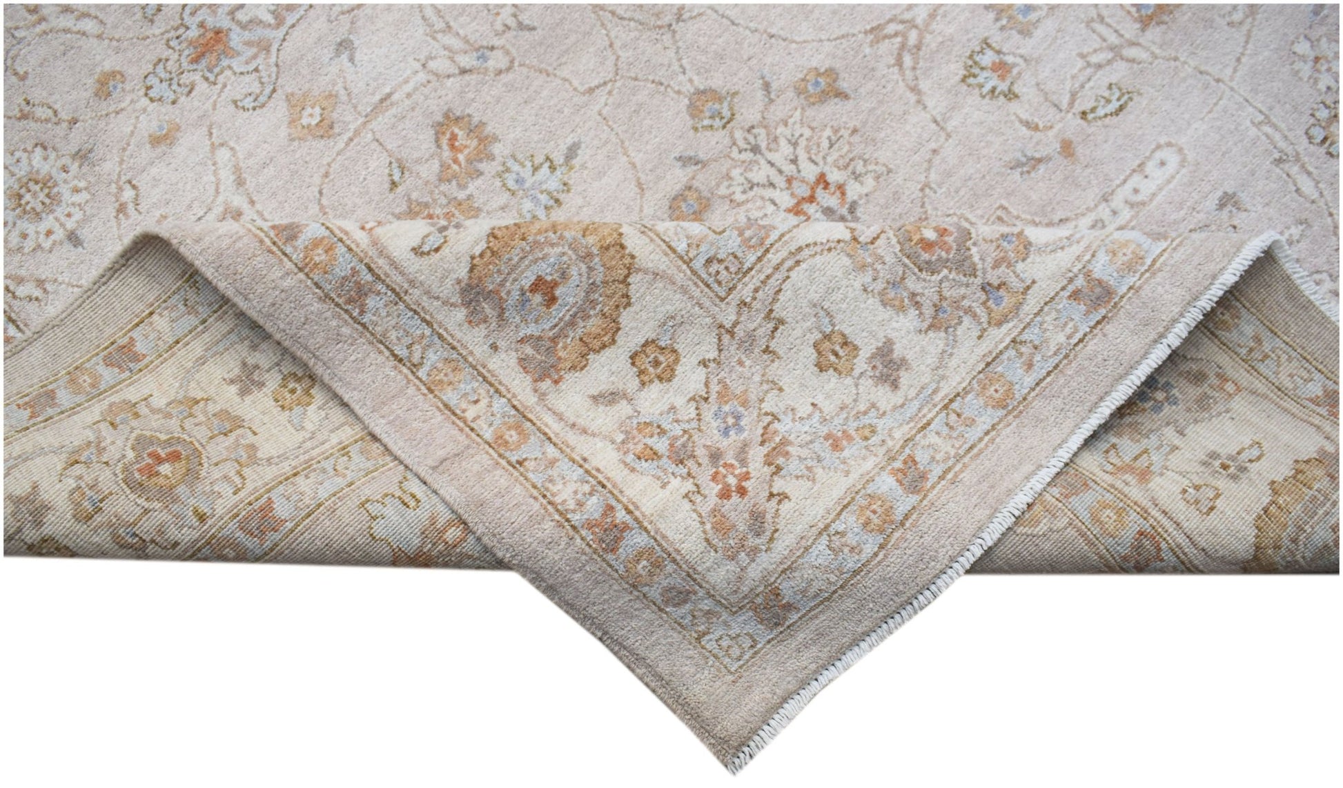 A handwoven Afghan Chobi rug featuring a traditional floral pattern in soft, earthy wood tones.