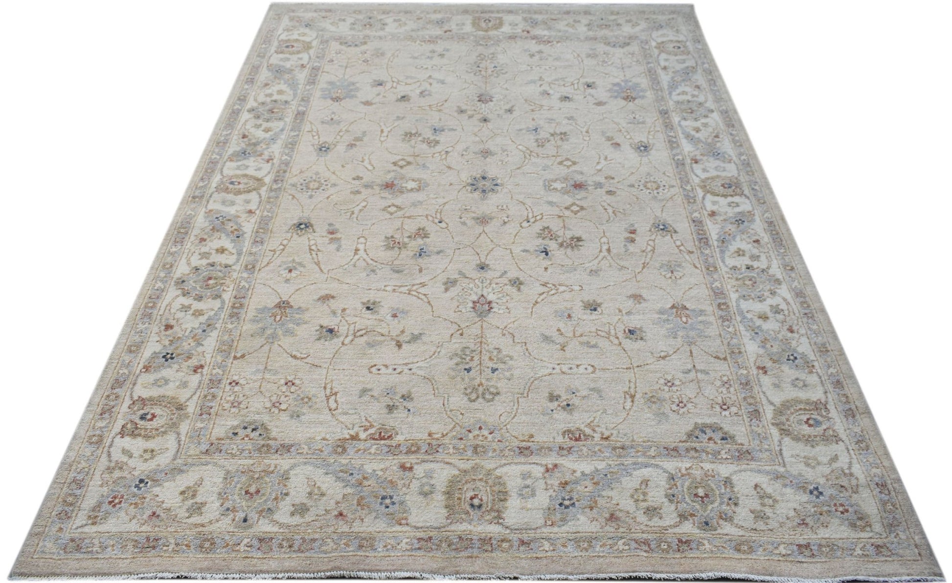 A rectangular Afghan Chobi rug featuring a traditional floral pattern in soft, earthy tones.