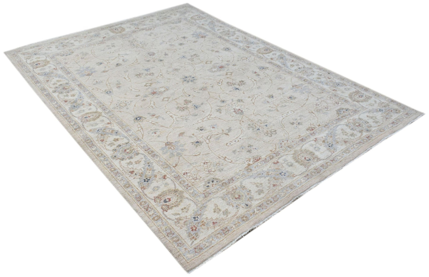 A rectangular Afghan Chobi rug featuring a traditional floral pattern in soft beige and muted tones.