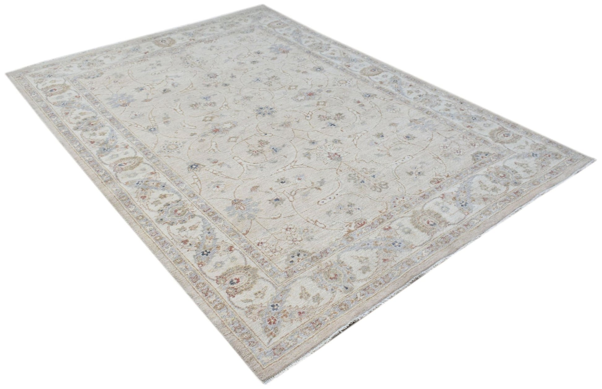 A rectangular Afghan Chobi rug featuring a traditional floral pattern in soft beige and muted tones.