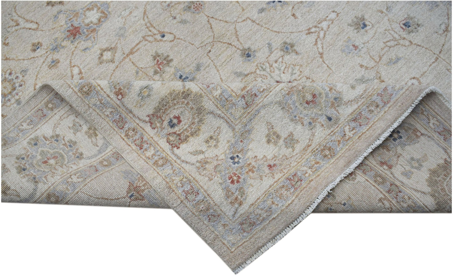A handwoven Afghan Chobi rug featuring a traditional floral pattern in soft, earthy tones.