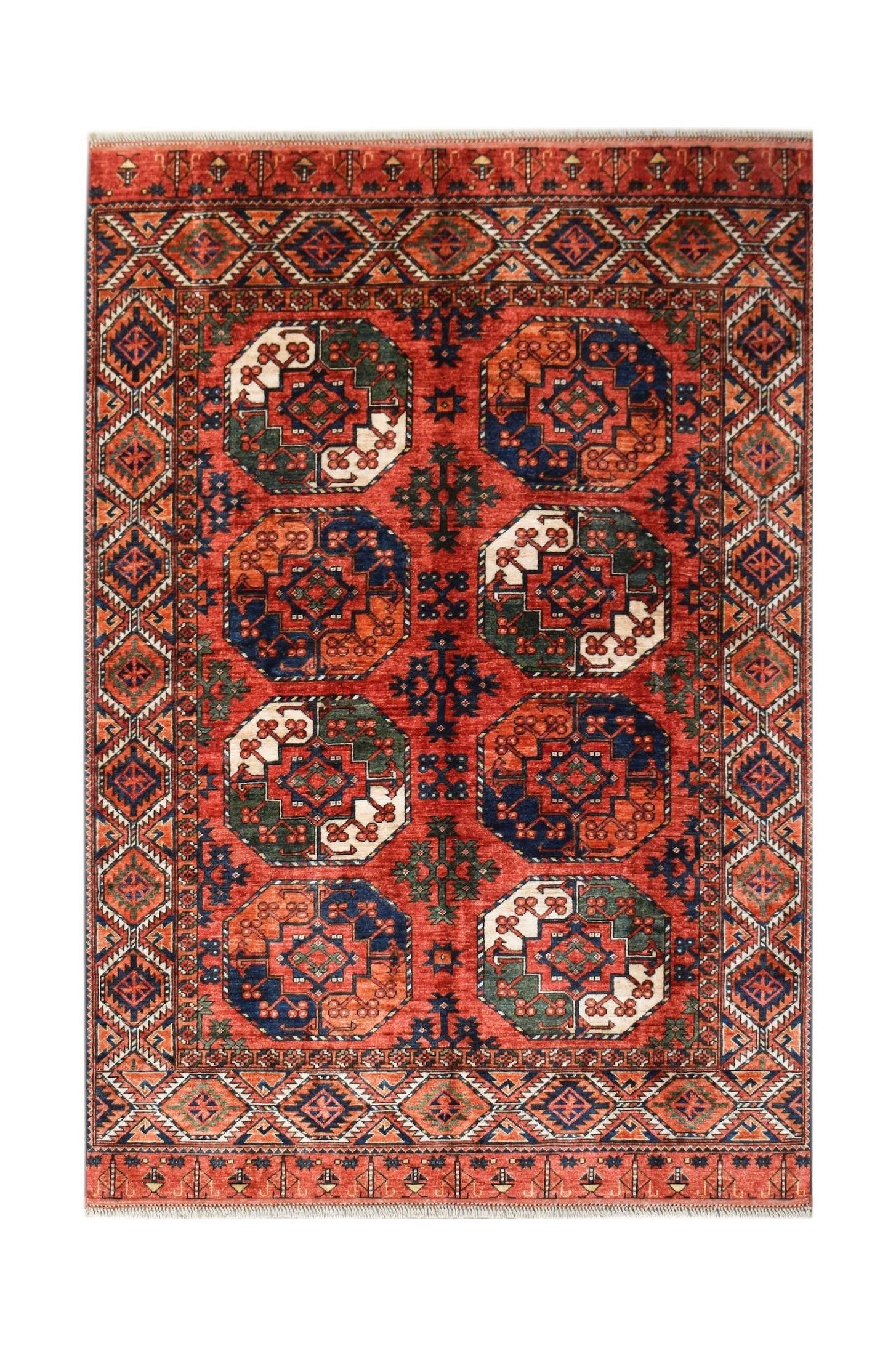 Handwoven Afghan Chobi rug featuring a traditional geometric pattern in red, blue, and cream tones.