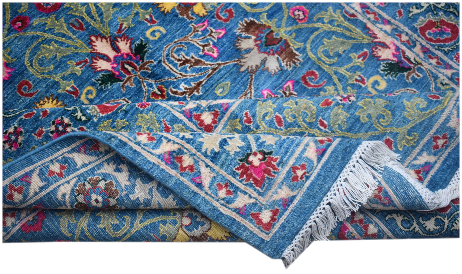 A handwoven Afghan Chobi rug featuring intricate floral patterns in blue, red, and cream tones.