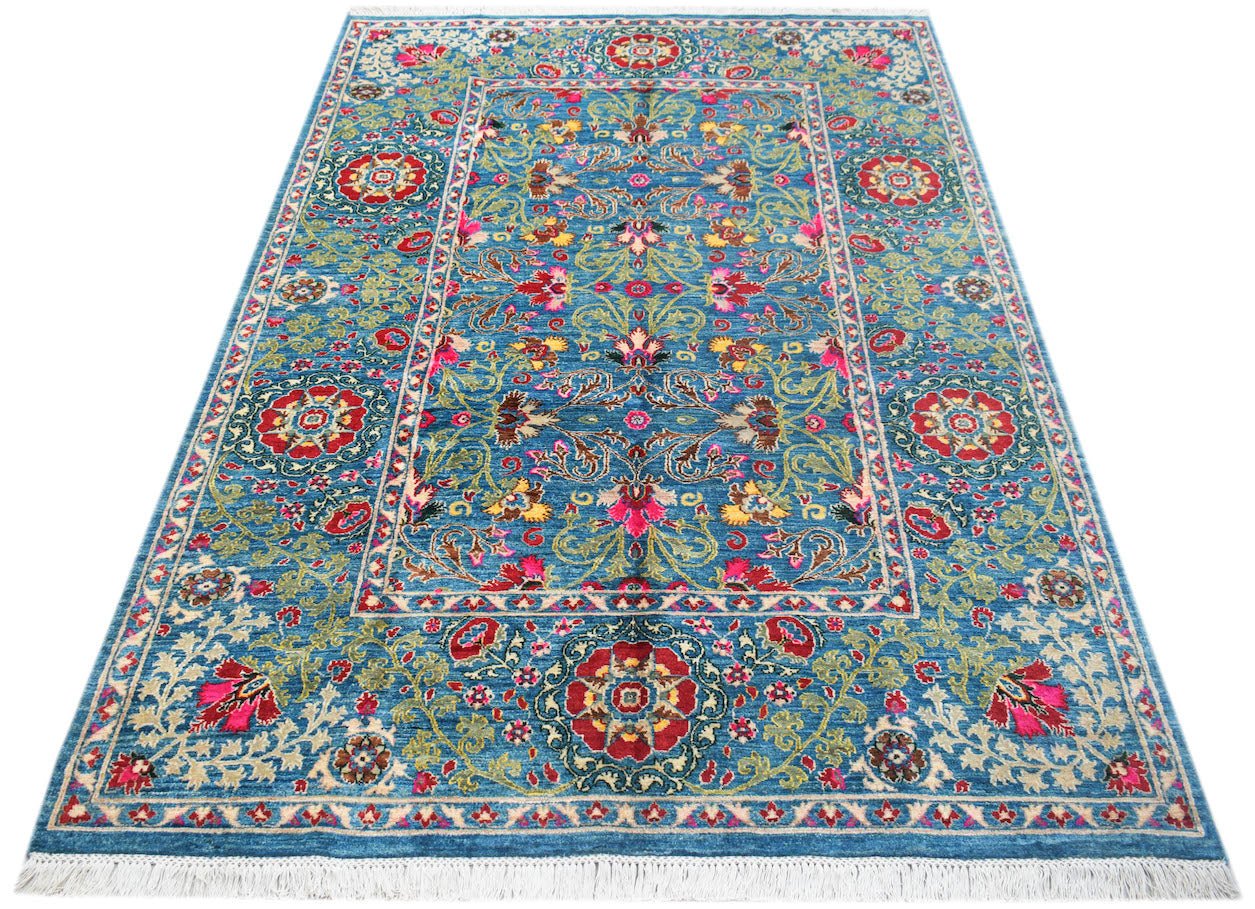 A rectangular Afghan Chobi rug featuring intricate floral patterns in red and blue tones.