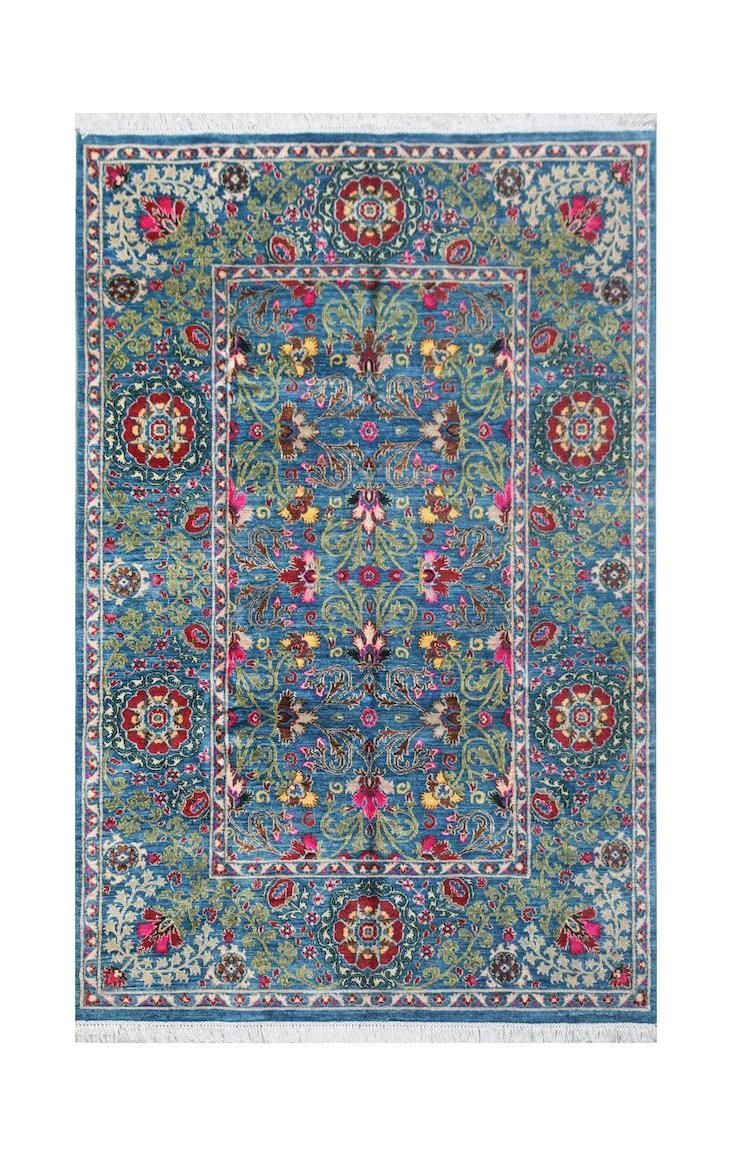 A rectangular Afghan Chobi rug featuring a traditional floral pattern in blue, red, and green.