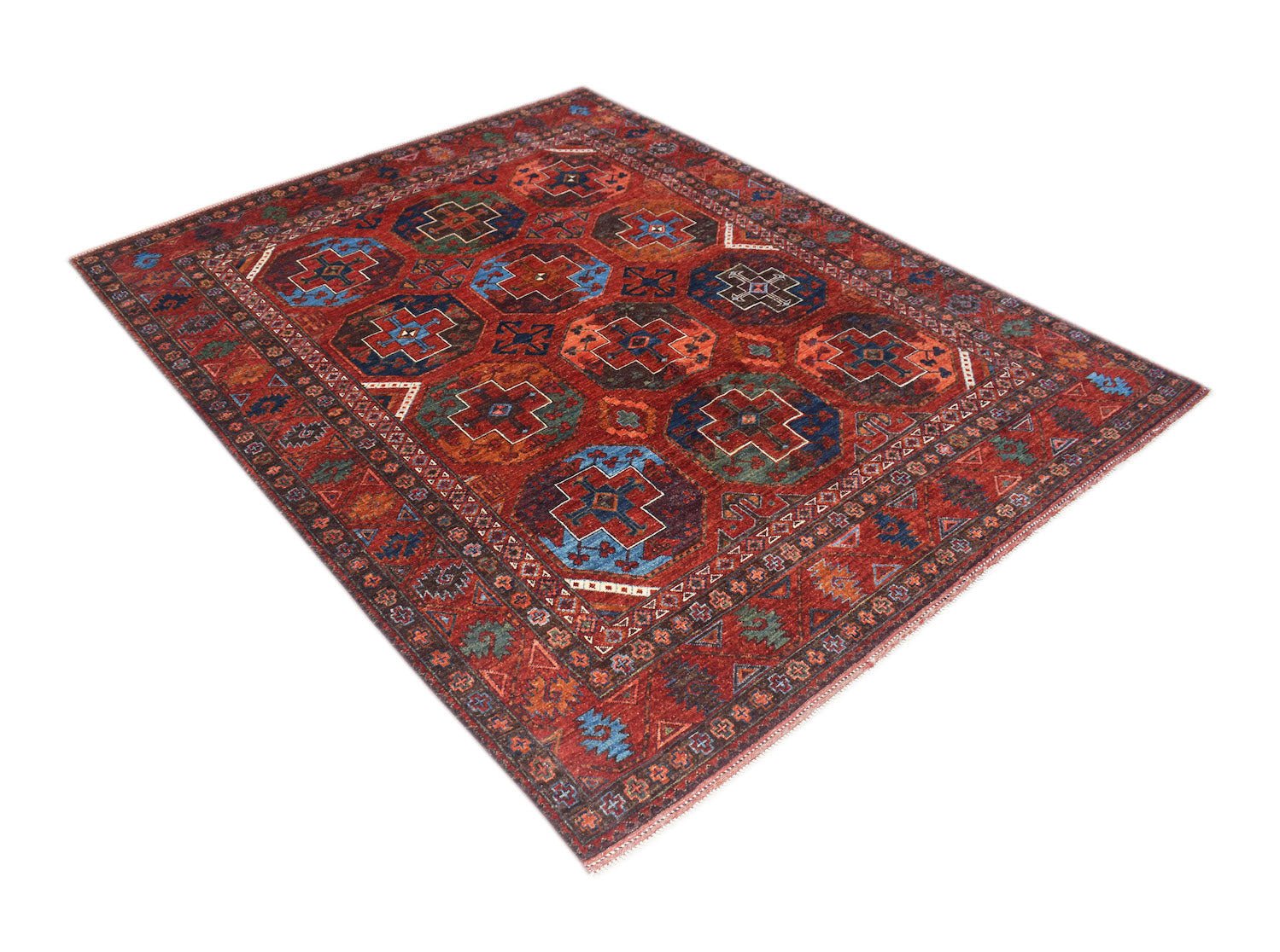 A rectangular Afghan Chobi rug featuring a traditional geometric pattern in shades of red and blue.