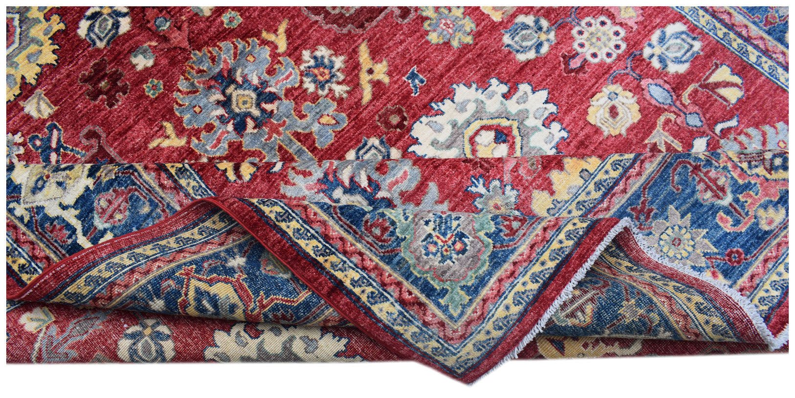 A handmade Afghan Chobi rug featuring a traditional floral pattern in red, blue, and cream tones.