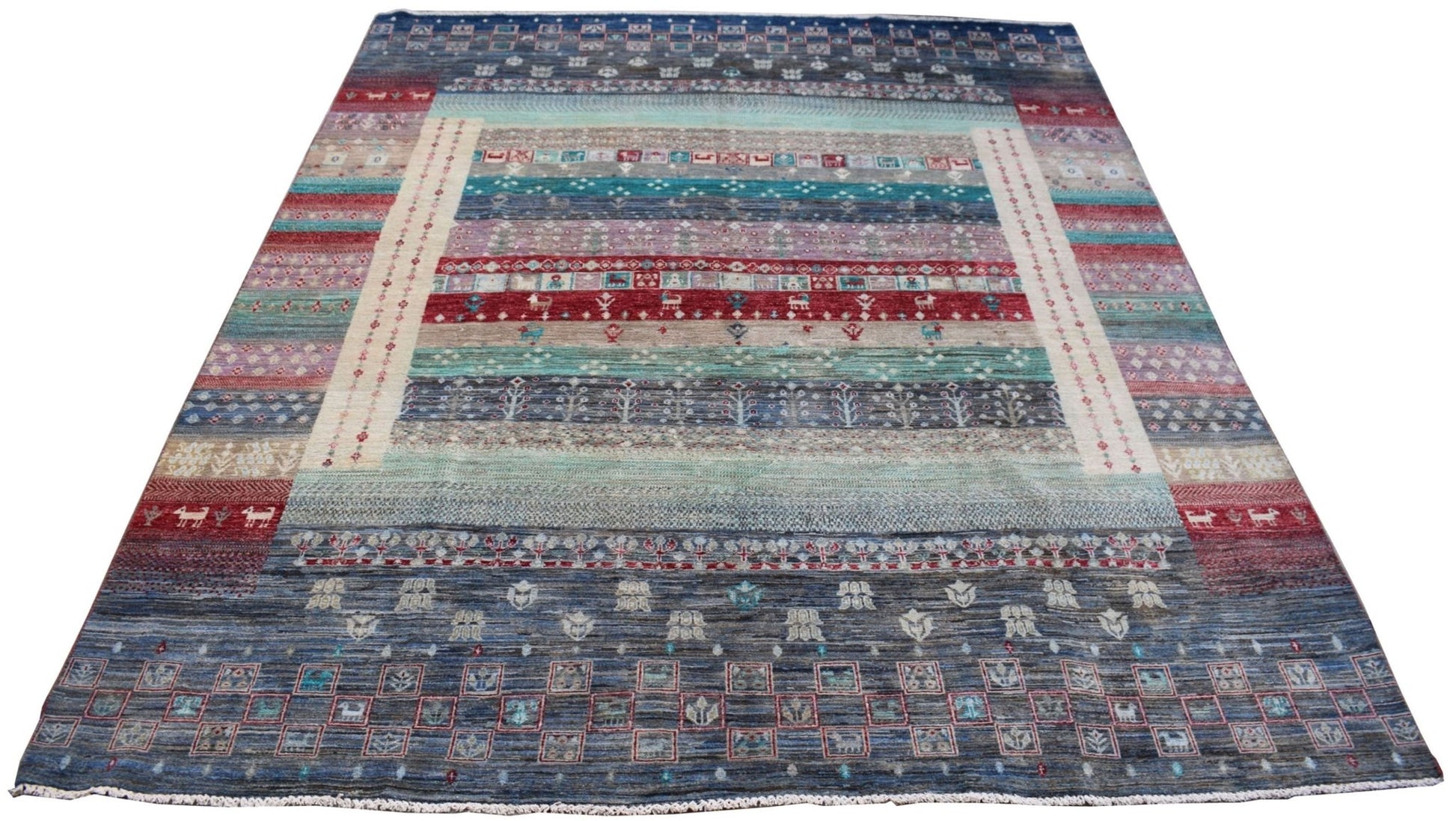 A handmade Afghan Chobi rug featuring horizontal bands of geometric patterns in earthy tones.