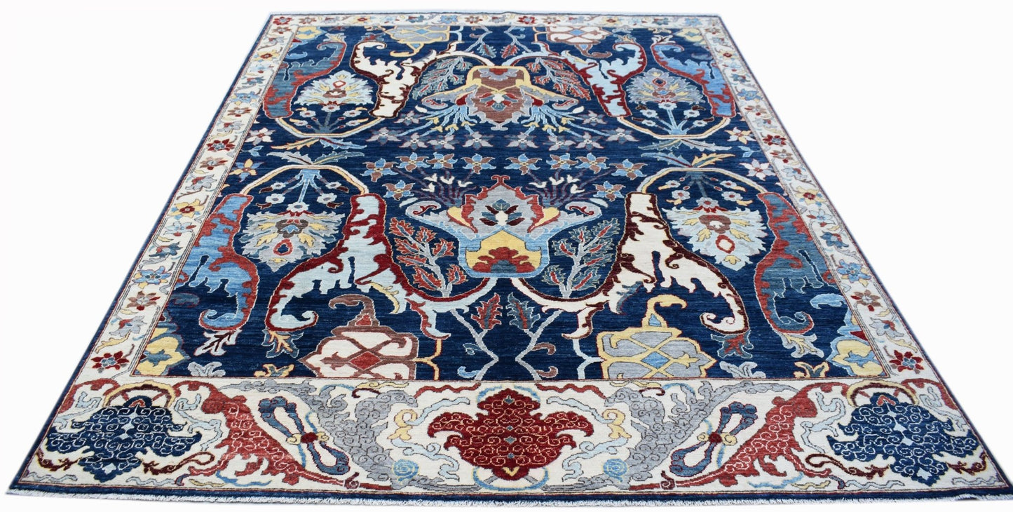 A rectangular Afghan Chobi rug featuring a traditional floral pattern in blue, red, and cream.