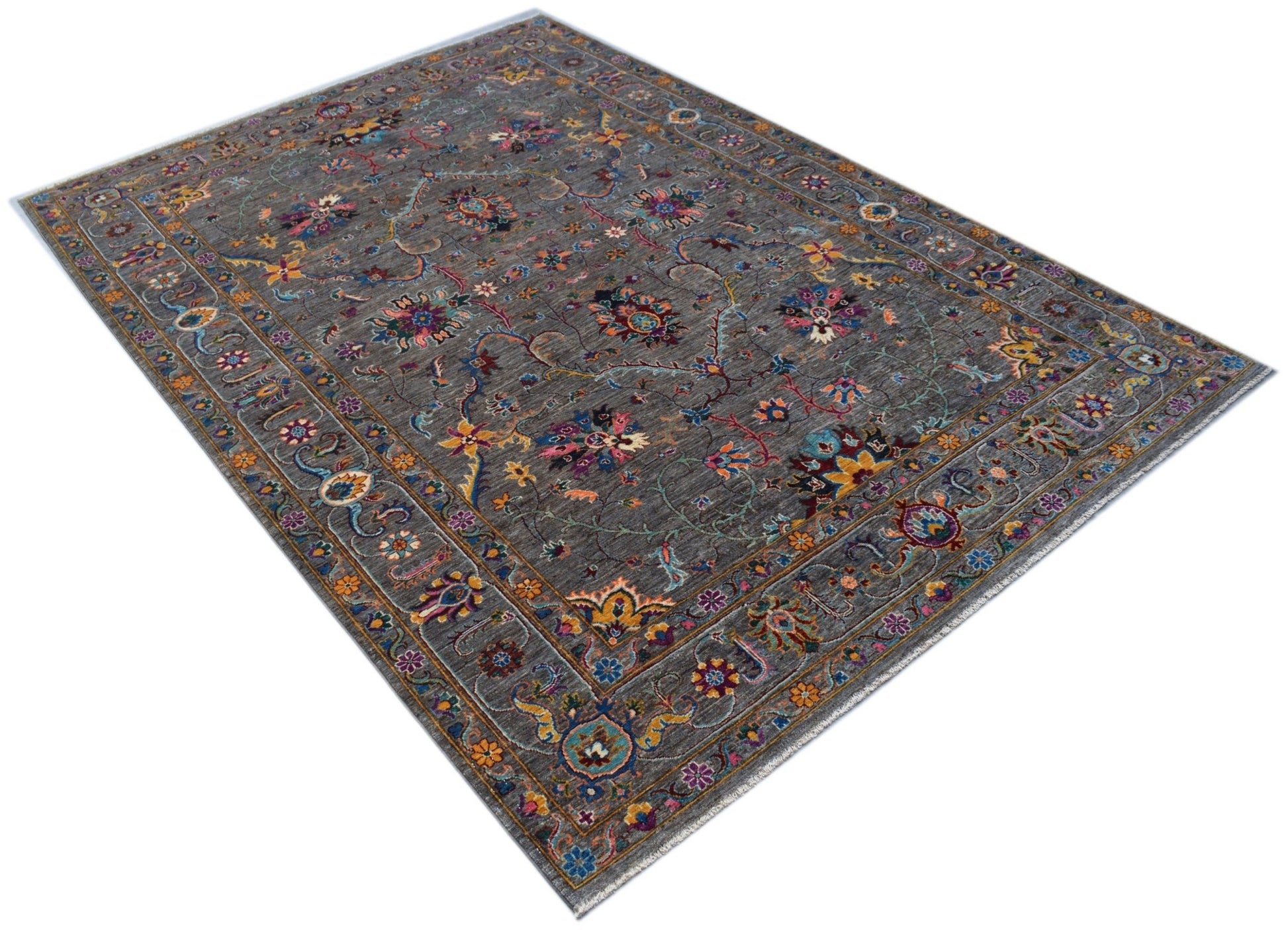 A rectangular Afghan Chobi rug featuring a grey field with intricate floral patterns.