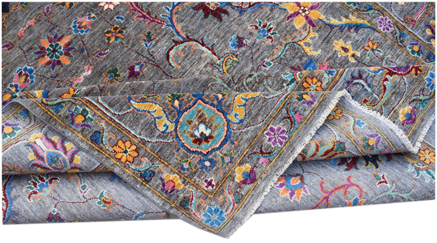 A handwoven Afghan Chobi rug featuring a grey field with vibrant floral patterns and a border.