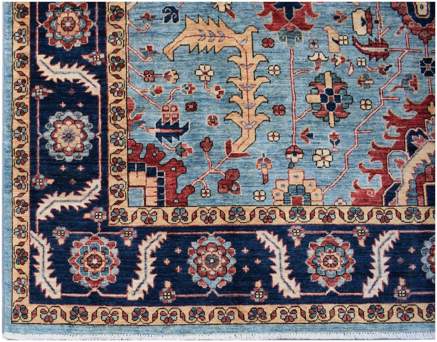 Handmade Afghan Chobi rug featuring a traditional floral pattern in blue, red, and beige tones.