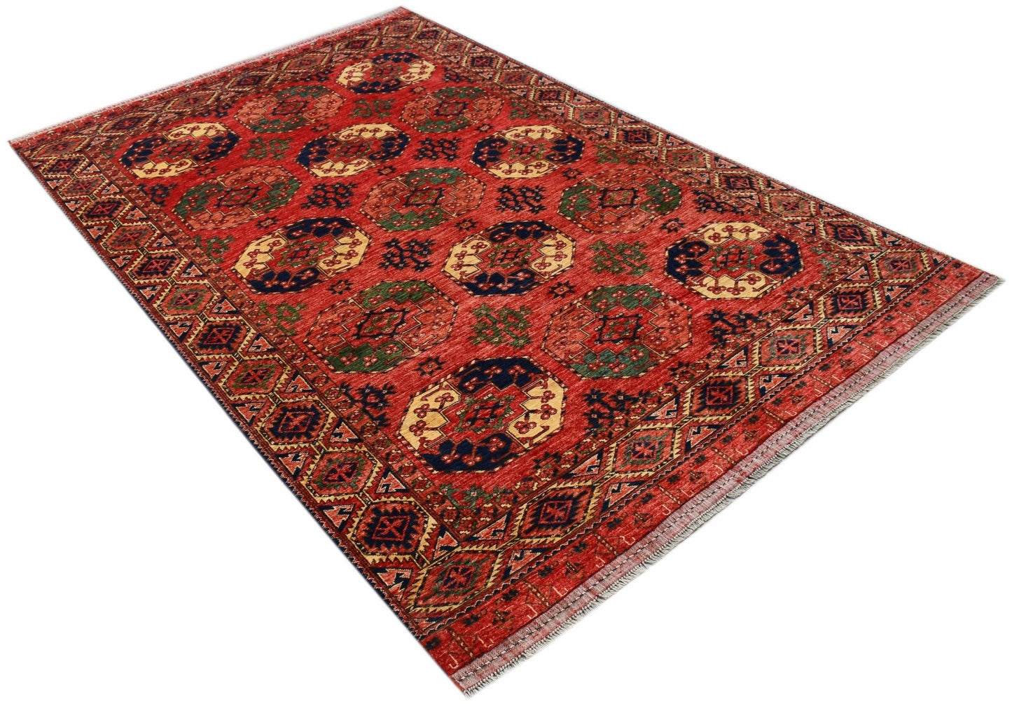 A rectangular Afghan Chobi rug featuring a traditional geometric pattern in red and blue tones.
