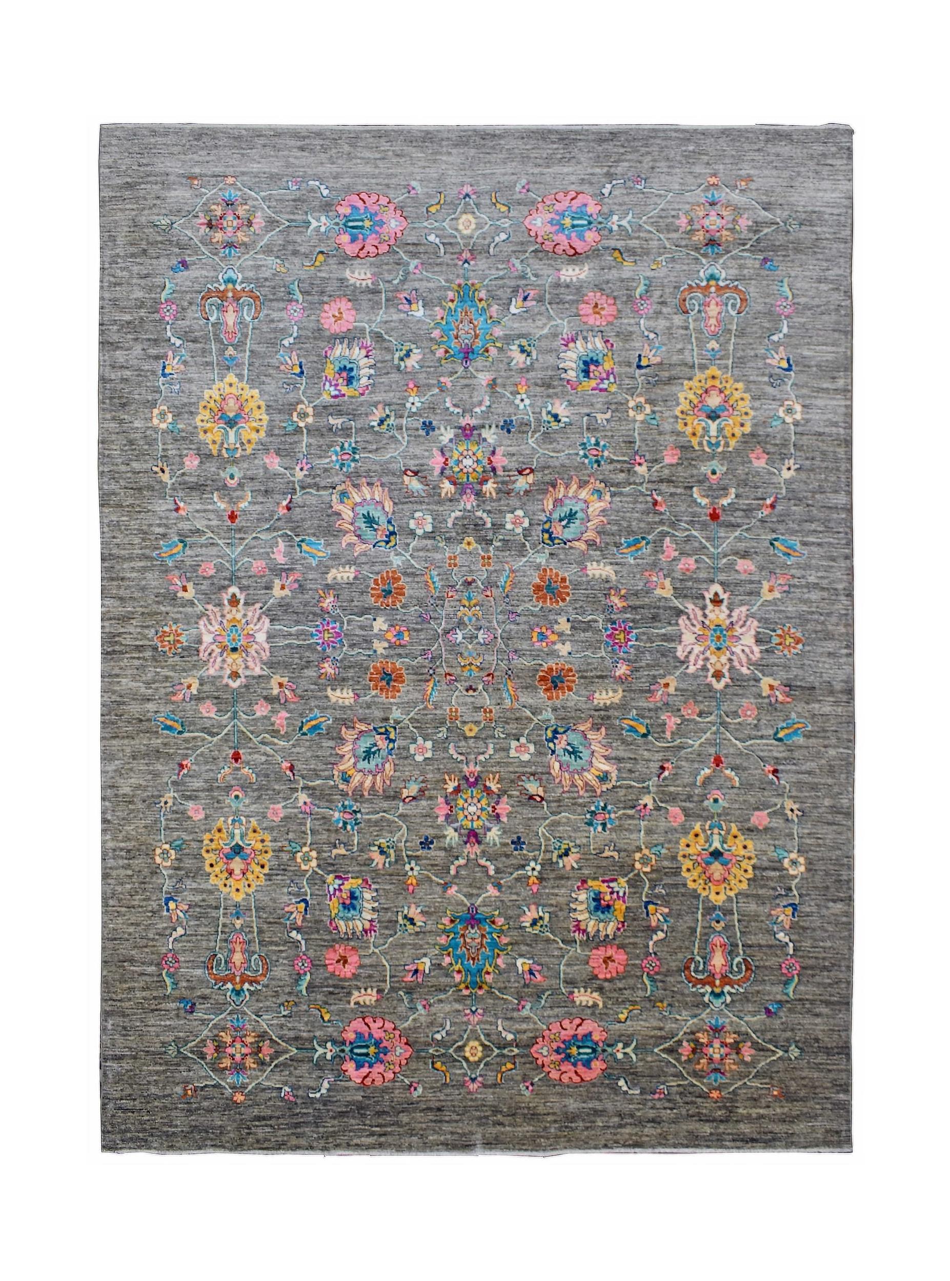 Handwoven Afghan Chobi rug featuring a floral pattern in vibrant colors on a grey wool background.