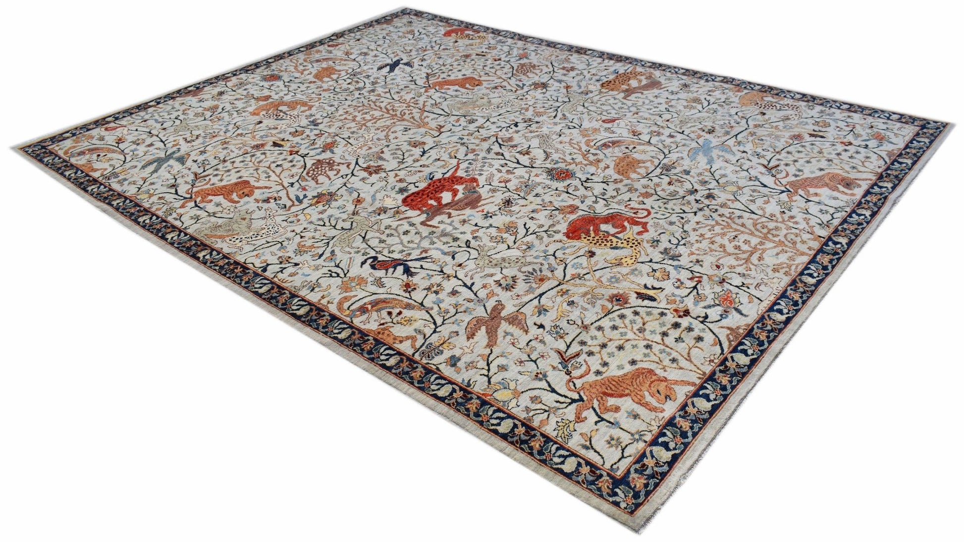 An Afghan Chobi rug featuring a traditional hunting scene with animals on a light background.