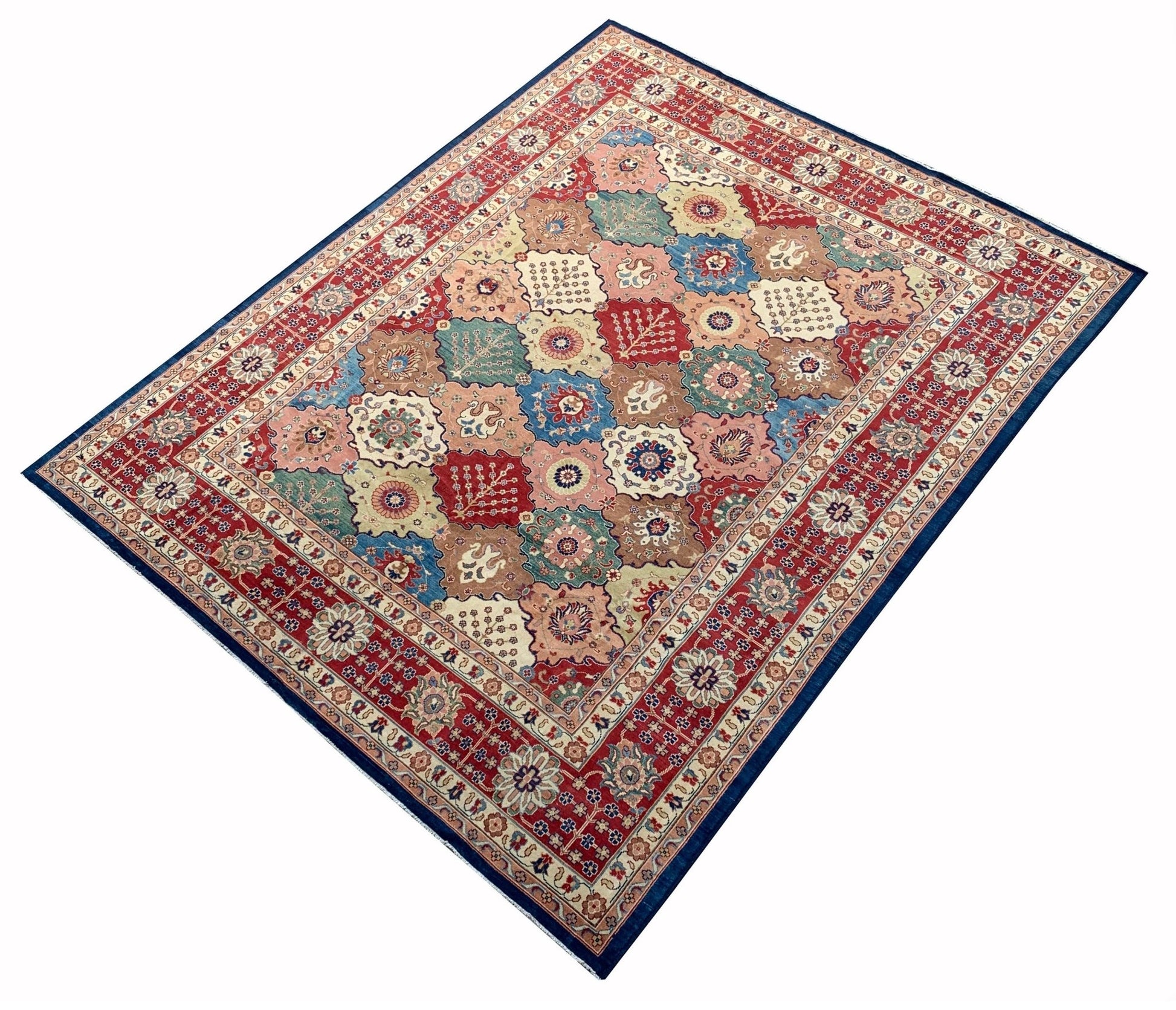 An Afghan Chobi rug featuring a geometric patchwork of floral motifs in muted earthy tones.