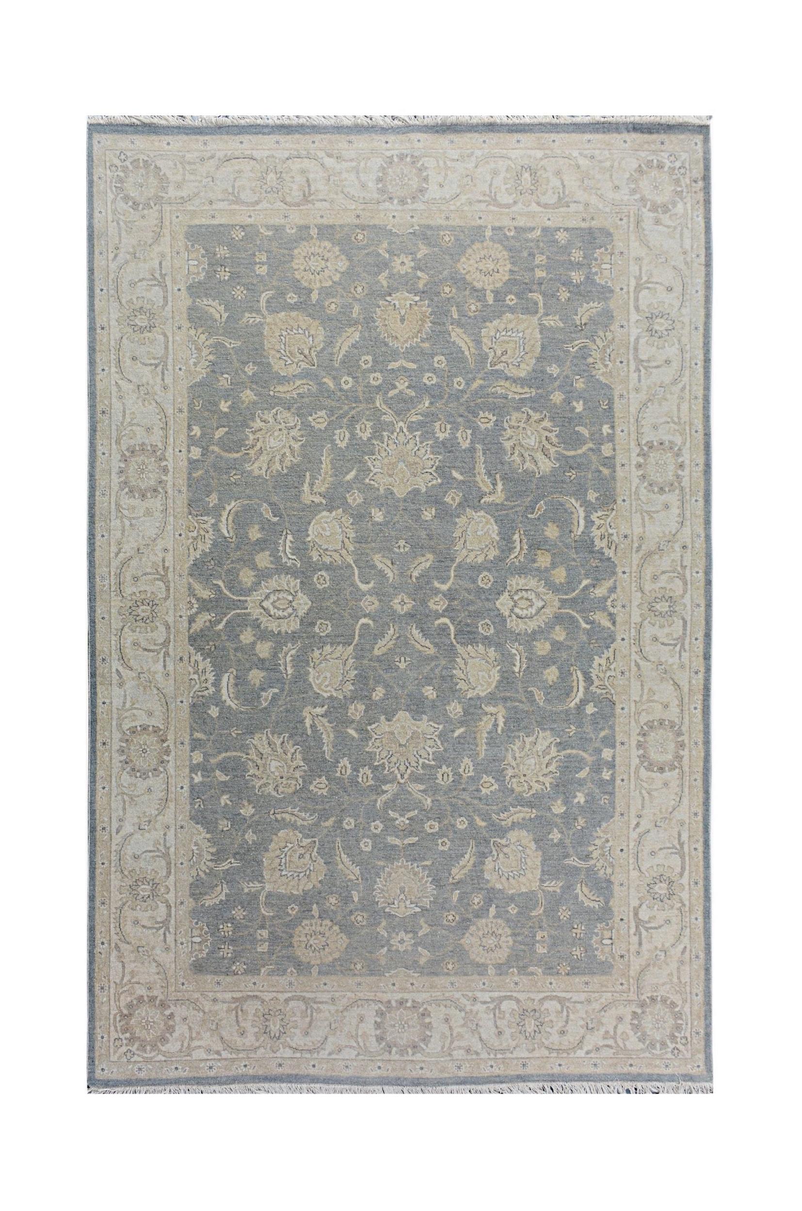 A rectangular Afghan Chobi rug featuring a traditional floral pattern in blue and beige tones.