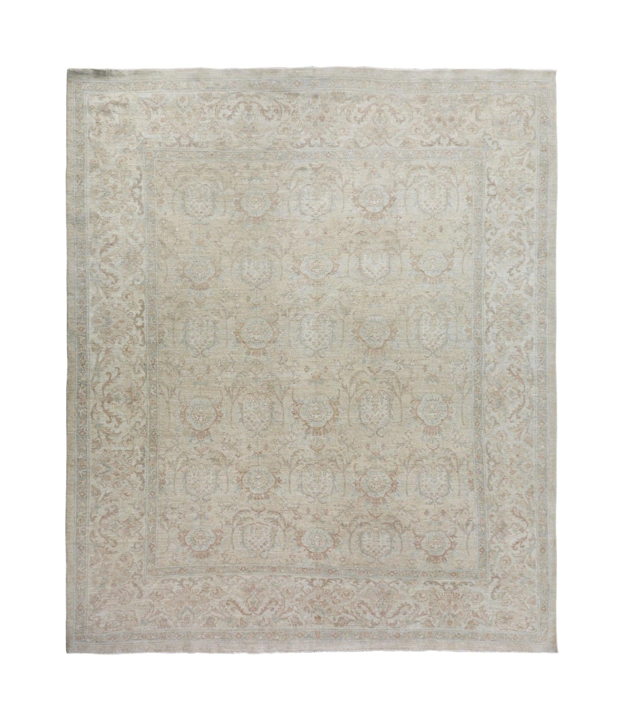 A handmade Afghan Chobi rug featuring a traditional floral pattern in soft beige and wood tones.